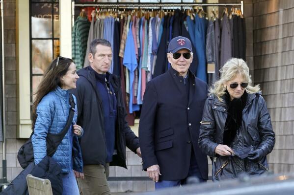 President Joe Biden shops with first lady Jill Biden and their daughter Ashley Biden in Nantucket, Mass., Saturday, Nov. 26, 2022. (AP Photo/Susan Walsh)