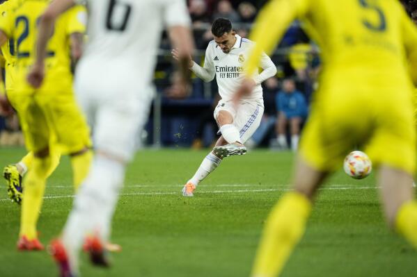 Real Madrid's Dani Ceballos scores his side's third goal during the Copa del Rey round of 16 soccer match between Villarreal CF and Real Madrid at La Ceramica stadium in Villarreal, Spain, Thursday, Jan. 19, 2023. (AP Photo/Jose Breton)