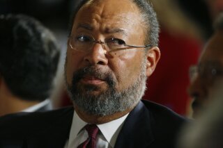 
              FILE - In this Thursday, March 12, 2009, file photo, then-Citigroup CEO Richard Parsons listens as President Barack Obama speaks about the economy at Business Roundtable, an association of chief executive officers of leading U.S. companies, at a hotel in Washington. On Tuesday, Sept. 25, 2018, CBS said it has named media industry veteran Richard Parsons as interim chairman of the board as the company moves to reshape itself following the ouster of longtime chief Les Moonves. (AP Photo/Charles Dharapak, File)
            