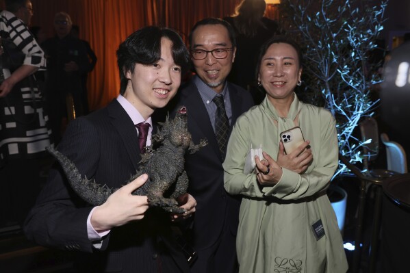 Tatsuji Nojima, from left, Masaki Takahashi, and Kiyoko Shibuya attend the 96th Academy Awards Oscar nominees luncheon on Monday, Feb. 12, 2024, at the Beverly Hilton Hotel in Beverly Hills, Calif. (Photo by Danny Moloshok/Invision/AP)