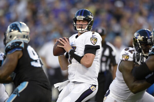 FILE - Baltimore Ravens quarterback Ryan Mallett looks to pass during the first half of an NFL preseason football game against the Carolina Panthers, Aug. 11, 2016, in Baltimore. Mallett, who played for New England, Houston and Baltimore during five seasons in the NFL, has died. He was 35. Mallett died in an apparent drowning, according to the Okaloosa County Sheriff’s Office. Mallett was a football coach at White Hall High School in his native Arkansas, and the school district also confirmed his death in a post on its website. (AP Photo/Nick Wass, File)