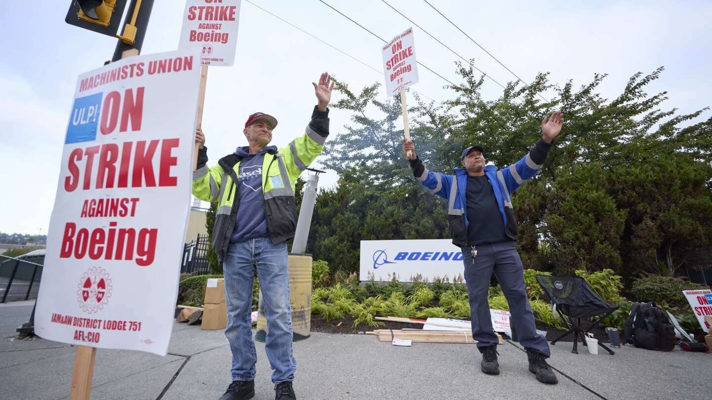 Boeing strike: 33,000 factory workers walk off job over pay