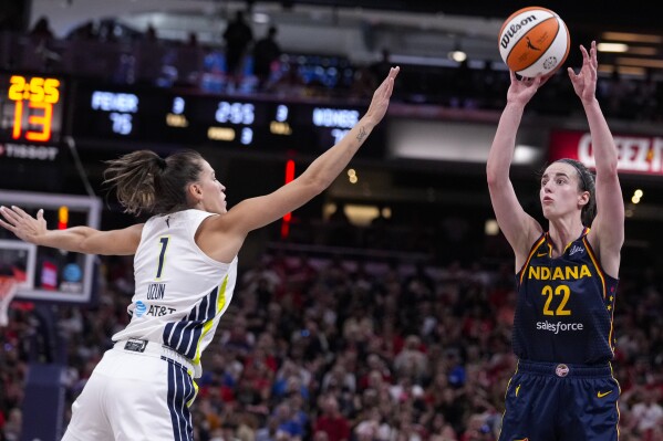 Caitlin Clark scores career-high 35, Kelsey Mitchell adds 30 as Fever beat Wings 110-109 | AP News