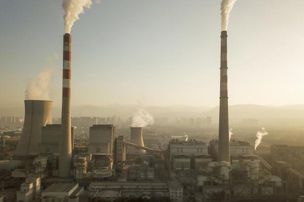 Official: China Mining More Coal But Increasing Wind, Solar | Ap News