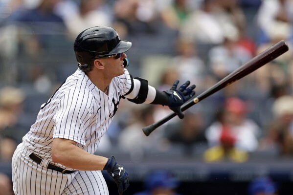 New York Yankees designated hitter Josh Donaldson hits a home run during the second inning of a baseball game against the Chicago Cubs, Saturday, July 8, 2023, in New York. (AP Photo/Adam Hunger)