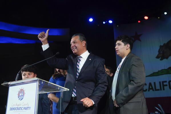 Sen. Alex Padilla, D-Calif., gives a thumb up on stage as he is joined by his family at an election-night party in Los Angeles, Tuesday, Nov. 8, 2022. Padilla has been elected to his first full term as U.S. senator, solidifying his position as a top Latino elected official in the United States and a leading Democratic voice for more expansive immigration laws. (AP Photo/Jae C. Hong)