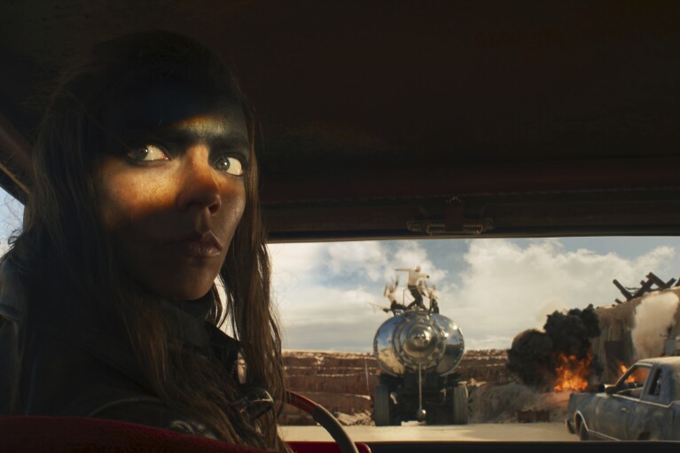 This image released by Warner Bros. Pictures shows Anya Taylor-Joy in a scene from "Furiosa: A Mad Max Saga." (Warner Bros. Pictures via AP)