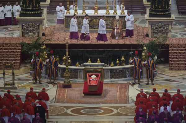 The body of Pope Francis lies inside St. Peter's Basilica at the Vatican, Wednesday, April 23, 2025, where he will lie in state for three days. (AP Photo/Andrew Medichini, Pool)