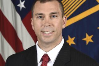 In this image provided by the U.S. Army, Derek Tournear, director of the Space Development Agency, poses for his official portrait at the Pentagon on May 20, 2019. The U.S. will spend $1.3 billion to develop advanced satellites that will be able to better track hypersonic missile threats. The Pentagon on July 18, 2022, announced two new contracts that will put the detection and tracking systems in orbit by 2025. Tournear says the contracts will provide 28 satellites, as the U.S. moves to greatly expand and enhance its ability to counter increasing threats from Russia and China. (Monica King/U.S. Army via AP)