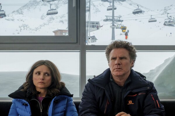 This image released by Fox Searchlight shows Julia Louis-Dreyfus, left, and Will Ferrell in a scene from "Downhill," a remake of the Swedish film “Force Majeure," which will be featured at the Sundance Film Festival. The annual film festival will run from Jan. 23 thru Feb. 2. (Jaap Buitendijk/Fox Searchlight via AP)