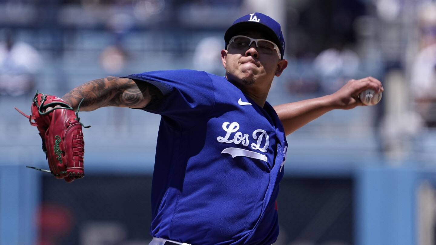 Los Angeles Dodgers pitcher Julio Urias celebrates the end of the