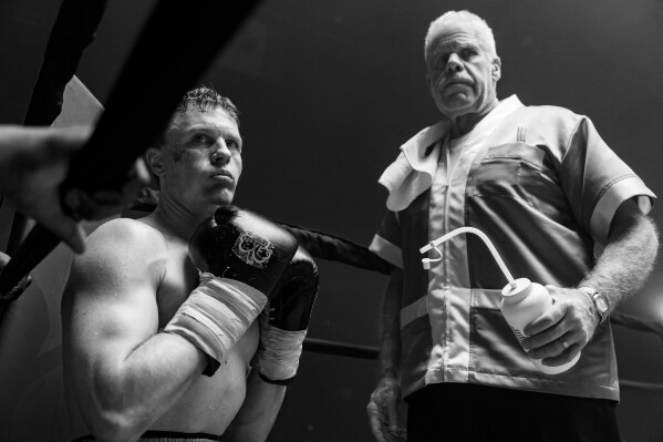 This image released by Falling Forward Films shows Michael Pitt, left, and Ron Perlman in a scene from "Day of the Fight." (Falling Forwrd Films via AP)