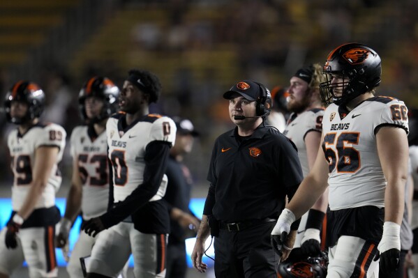 Oregon State coach Jonathan Smith watches during the first half of the team's NCAA college football game against California on Saturday, Oct. 7, 2023, in Berkeley, Calif. (AP Photo/Godofredo A. Vásquez)