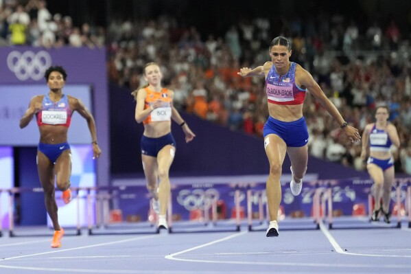 Sydney McLaughlin-Levrone, of the United States, wins the women's 400-meters hurdles final at the 2024 Summer Olympics, Thursday, Aug. 8, 2024, in Saint-Denis, France. (AP Photo/Petr David Josek)