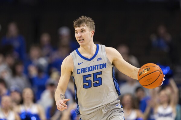 Creighton's Baylor Scheierman drives down court against Georgetown during the second half of an NCAA college basketball game ,Tuesday, Feb. 13, 2024, in Omaha, Neb. (AP Photo/Rebecca S. Gratz)
