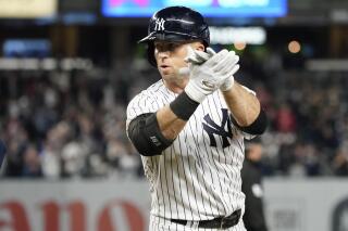 New York Yankees' Brett Gardner reacts after hitting an an RBI-single in the ninth inning of a baseball game against the Tampa Bay Rays, Friday, Oct. 1, 2021, in New York. (AP Photo/Mary Altaffer)