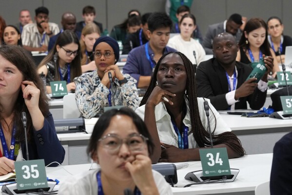 FILE - Claudia Ondo attends a youth session at the COP28 United Nations climate summit in Dubai, United Arab Emirates, on Thursday, Nov. 30, 2023.  (AP Photo/Rafiq Maqbool, File)