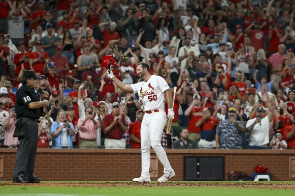 Reds hit six home runs, keep playoff hopes alive with 19-2 rout of Cardinals  - ABC News