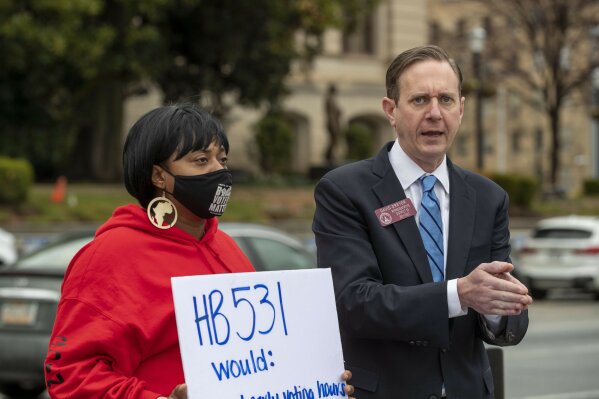 Rep. David Dreyer (D-Atlanta) speaks to demonstrators at an HB 531 protest outside of the Georgia State Capitol Building on day 25 of the legislative session in Atlanta, Monday, March 1, 2021. (Alyssa Pointer/Atlanta Journal-Constitution via AP)