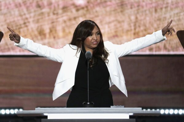 FILE- In this July 20, 2016 file photo, Lynne Patton waves during her speech on the third day of the Republican National Convention in Cleveland. Patton used Twitter to push back on an Aug. 28, 2020, New York Times report that three people who were recorded on video speaking with her didn't know their comments were going to end up being used in support of President Donald Trump in an almost 2 1/2-minute video aired at the 2020 Republican National Convention. (AP Photo/J. Scott Applewhite, File)