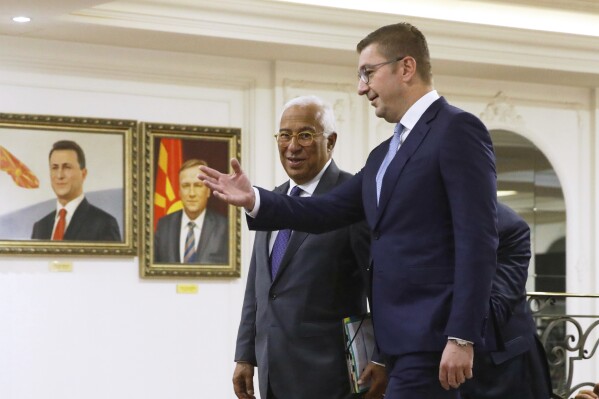 European Council President Antonio Costa, left, is welcomed by North Macedonia's Prime Minister Hristijan Mickoski upon arrival at the government building in Skopje, North Macedonia, on Thursday, May 15, 2025. (AP Photo/Boris Grdanoski)