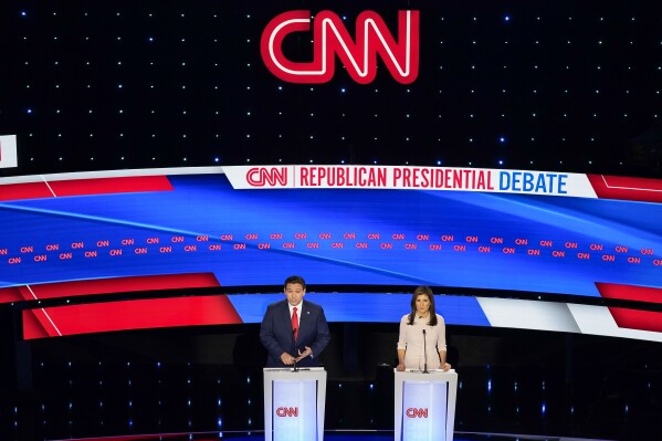 Former UN Ambassador Nikki Haley, right, and Florida Gov. Ron DeSantis, left, at the CNN Republican presidential debate at Drake University in Des Moines, Iowa, Wednesday, Jan. 10, 2024. (AP Photo/Andrew Harnik)