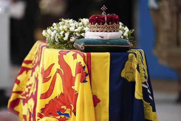 The Crown of Scotland sits atop the coffin of Queen Elizabeth II during a Service of Prayer and Reflection for her life at St Giles' Cathedral, Edinburgh, Monday, Sept. 12, 2022. (Jane Barlow/PA via AP)
