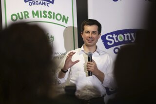 
              In this April 19, 2019, photo, Democratic presidential candidate South Bend Mayor Pete Buttigieg answers questions from employees during a campaign stop at a dairy company in Londonderry, N.H. 
Buttigieg’s presidential campaign has attention and money. Now he has to convert that into a sustainable operation that can keep him in the race well into next year. (AP Photo/Charles Krupa)
            