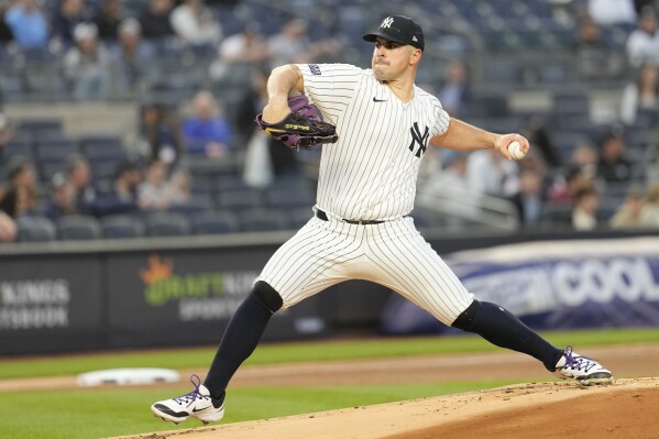 New York Yankees pitcher Carlos Rodon delivers against the Miami Marlins in the first inning of a baseball game, Tuesday, April 9, 2024, in New York. (AP Photo/Mary Altaffer)