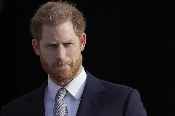FILE - Britain's Prince Harry arrives in the gardens of Buckingham Palace in London, Thursday, Jan. 16, 2020.  (AP Photo/Kirsty Wigglesworth, File)