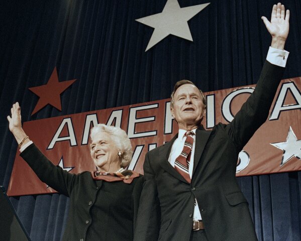
              FILE - In this Nov. 8, 1988 file photo, President-elect George H.W. Bush and his wife Barbara wave to supporters in Houston, Texas after winning the presidential election. Bush has died at age 94. Family spokesman Jim McGrath says Bush died shortly after 10 p.m. Friday, Nov. 30, 2018, about eight months after the death of his wife, Barbara Bush. (AP Photo/Scott Applewhite, File)
            
