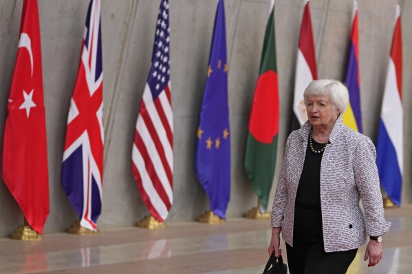 FILE - U. S. Treasury Secretary Janet Yellen leaves after attending G20's third Finance Ministers and Central Bank Governors (FMCBGs) meeting in Gandhinagar, India, July 17, 2023. Yellen is facing some deep skepticism from among the wealthy nations of the Group of 20 as almost two years of sanctions against Russia have deepened divisions within the group. As world leaders and finance ministers meet this week in India, fractures that have opened between some G20 nations may be more palpable.(AP Photo/Ajit Solanki, File)