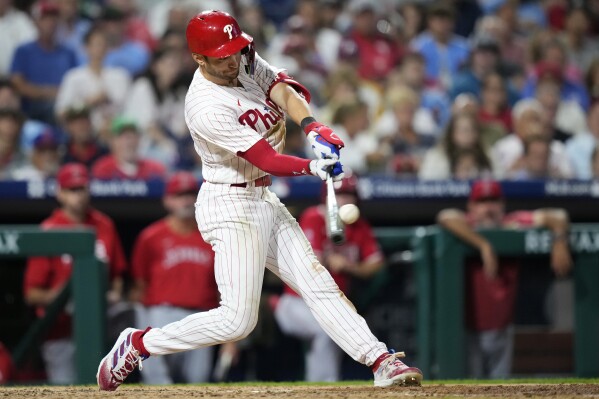 Philadelphia Phillies' Trea Turner hits a two-run home run against Los Angeles Angels pitcher Lucas Giolito during the fifth inning of a baseball game, Monday, Aug. 28, 2023, in Philadelphia. (AP Photo/Matt Slocum)