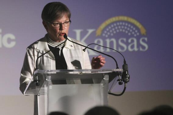 Kansas Gov. Laura Kelly announces that Japan's Panasonic Corp. is planning to build a multi-billion-dollar plant in Kansas for manufacturing electronic vehicle batteries, Wednesday, July 13, 2022, in Topeka, Kan. State officials believe the new plant would employ 4,000 people and that other businesses supplying or supporting it would add several thousand more jobs. (AP Photo/John Hanna)