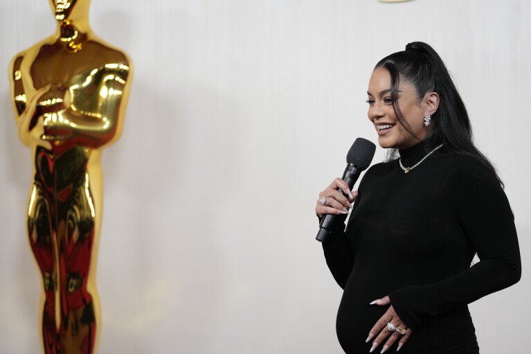 Vanessa Hudgens arrives at the Oscars on Sunday, March 10, 2024, at the Dolby Theatre in Los Angeles. (AP Photo/Ashley Landis)