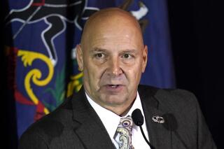 FILE - In this Nov. 25, 2020, file photo, state Sen. Doug Mastriano, R-Franklin, attends a hearing of the Pennsylvania State Senate Majority Policy Committee in Gettysburg, Pa. With Pennsylvania's wide-open races for governor and U.S. Senate taking shape, Republican candidates with strong ties to Donald Trump are running and considered strong contenders for the party's nominations, a powerful sign of the former president's enduring popularity in the GOP. (AP Photo/Julio Cortez, File)