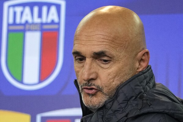 FILE - Italy's head coach Luciano Spalletti arrives at a press conference ahead of the Euro 2024 group C qualifying soccer match between Ukraine and Italy at the BayArena in Leverkusen, Germany, Sunday, Nov. 19, 2023. Spain eyes record, Italy seeks redemption. Both in Group B at Euro 2024 with Croatia and Albania (AP Photo/Martin Meissner, File)