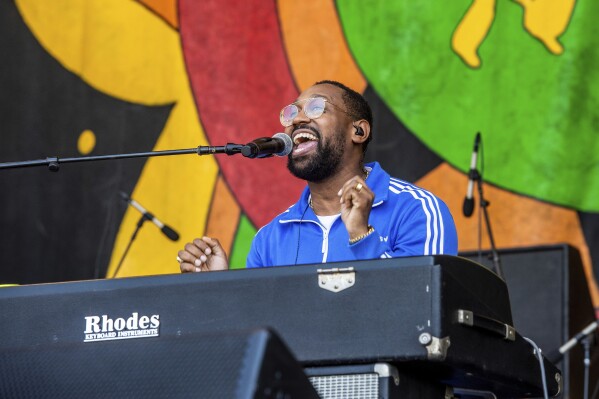 FILE - PJ Morton performs at the New Orleans Jazz and Heritage Festival, April 26, 2019, in New Orleans. Morton comes home with a new album and memoir dropping soon amid a Saturday afternoon performance May 4, 2024, at the New Orleans Jazz & Heritage Festival, which nears the end of an eight-day run. (Photo by Amy Harris/Invision/AP, File)