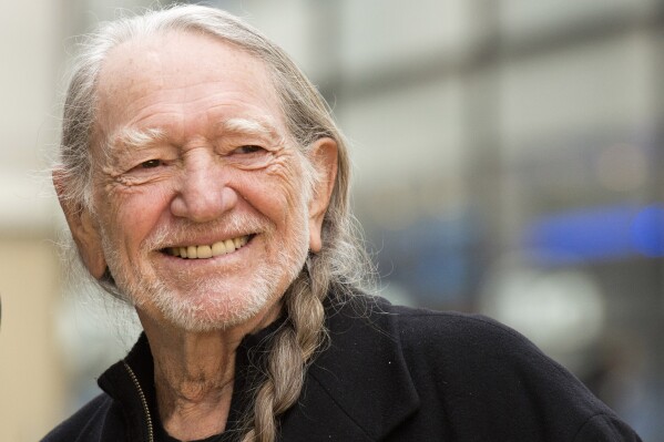 FILE - This Nov. 20, 2012 file photo shows country music legend Willie Nelson on NBC's "Today" show in New York. The country legend's new book, “Energy Follows Thought,” gives the stories behind his most famous songs. (Photo by Charles Sykes/Invision/AP, File)