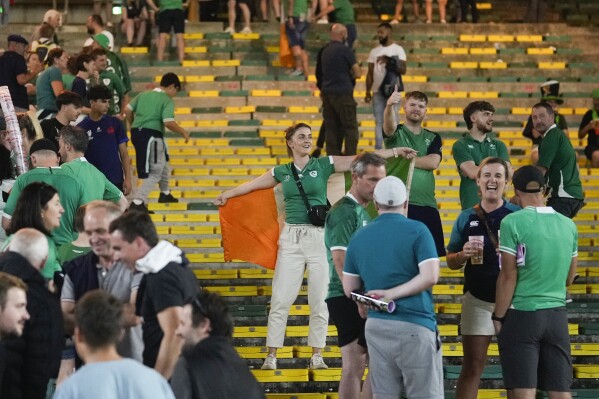 Irish supporters react following the Rugby World Cup Pool B match between Ireland and Tonga at the State de la Beaujoire in Nantes, France Saturday, Sept. 16, 2023. (AP Photo/Thibault Camus)