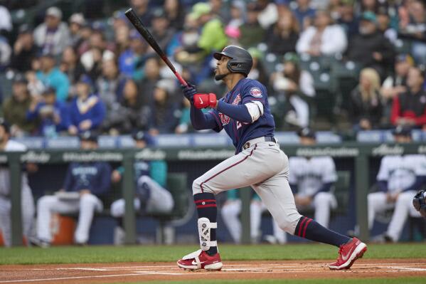 Minnesota Twins' Byron Buxton hits a two-run home run off a pitch from Seattle Mariners starter Chris Flexen during the first inning of a baseball game, Monday, June 13, 2022, in Seattle. (AP Photo/John Froschauer)