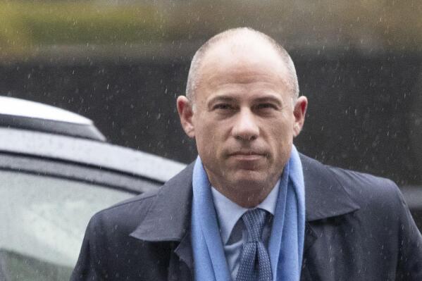 FILE - In this Dec. 17, 2019, file photo, attorney Michael Avenatti arrives at federal court in New York.  New York prosecutors have asked a judge to order Avenatti to begin serving a 2 1/2-year prison term. The request comes a year after Avenatti was convicted of trying to extort up to $25 million from Nike. (AP Photo/Mark Lennihan, File)