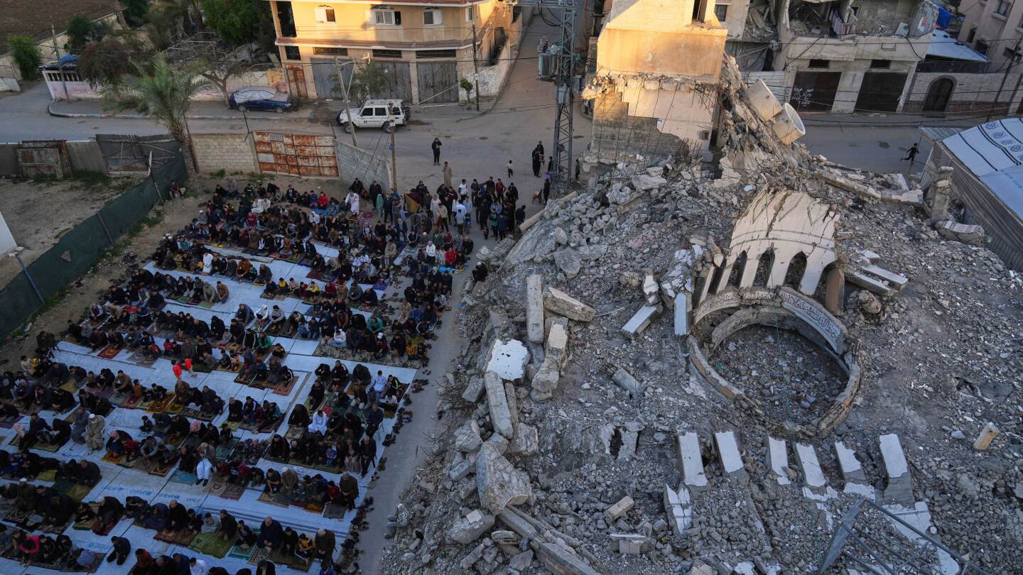 'Eid of sadness': Palestinians in Gaza mark Muslim holiday with dwindling food and no end to war