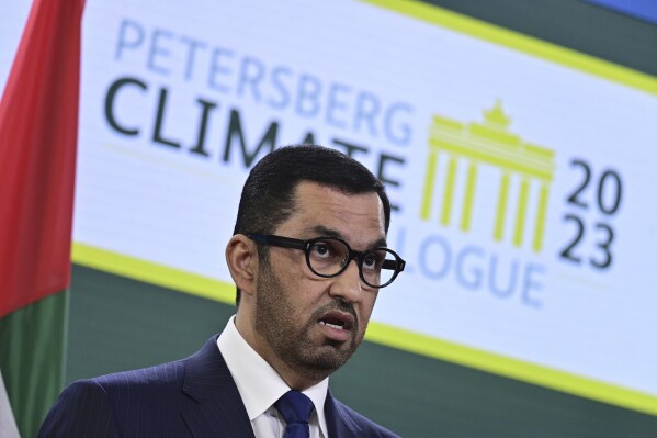 FILE - The Minister of Industry and Advanced Technology in the United Arab Emirates (UAE) and COP28 UAE President-Designate, Sultan Ahmed al-Jaber, attends a joint press conference on the second day of the Petersberg Climate Dialogue in Berlin, Germany, on May 3, 2023. The president of this years United Nations' climate talks has urged the oil and gas industry to reach net zero greenhouse gas emissions by or before 2050 at a speech Thursday, July 6, 2023, to oil producing states. (John MacDougall/Pool Photo via AP, File)