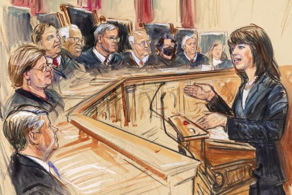 FILE - This artist sketch depicts Solicitor General Elizabeth Prelogar, right, presenting an argument before the Supreme Court, Monday, Nov. 1, 2021, in Washington. Justices seated from left are Associate Justice Brett Kavanaugh,  Associate Justice Elena Kagan, Associate Justice Samuel Alito, Associate Justice Clarence Thomas, Chief Justice John Roberts, Associate Justice Stephen Breyer, Associate Justice Sonia Sotomayor, Associated Justice Neil Gorsuch and Associate Justice Amy Coney Barrett. (Dana Verkouteren via AP, FILE)