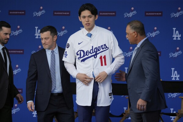Ohtani informed the Los Angeles Dodgers they had landed prized Japanese pitcher Roki Sasaki | AP News