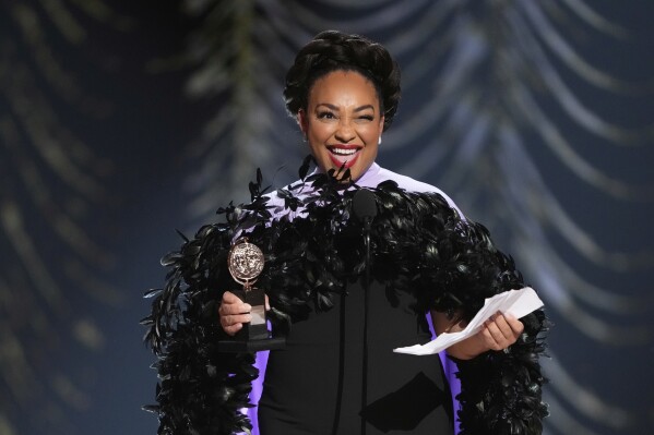 Natalie Venetia Belcon accepts the award for best performance by an actress in a featured role in a musical for "Buena Vista Social Club" during the 78th Tony Awards on Sunday, June 8, 2025, at Radio City Music Hall in New York. (Photo by Charles Sykes/Invision/AP)