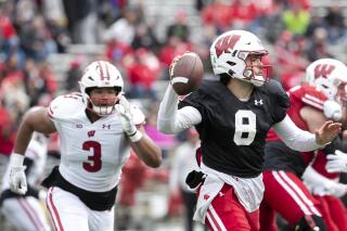 Wisconsin Badgers quarterback Tanner Mordecai (8) looks to pass the ball during the Launch at Camp Randall Stadium in Madison, Wis., Saturday, April 22, 2023. (Samantha Madar/Wisconsin State Journal via AP)