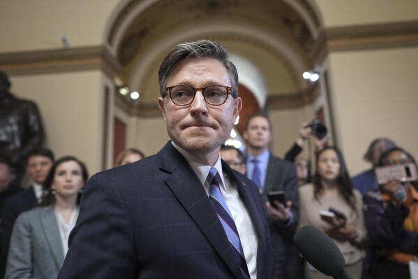 Speaker of the House Mike Johnson, R-La., talks to reporters just after House Republicans narrowly approved their budget framework, at the Capitol in Washington, April 10, 2025. (AP Photo/J. Scott Applewhite, File)