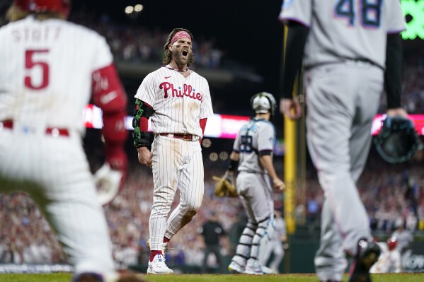 Zack Wheeler strikes out 8, NL champion Phillies beat Marlins 4-1 in Wild  Card Series opener